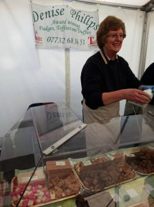 Denise Phillips at her stand presenting toffee, fudge and truffles to the customers