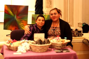Fransina with her family member at her stand at the market