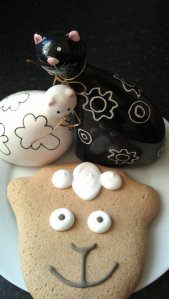 White cat, black cat and Lenny the lamb