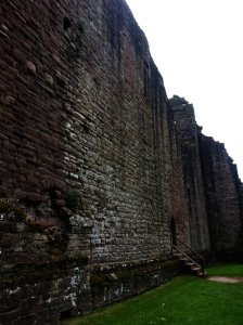 Outside walls with a secret entrance, now an open gate for the tourists