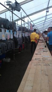 Volunteers and a long row of casks.