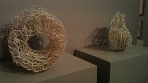 Nest I by Wendy Houghton (on the left) with another artwork in the background - priced at £450 