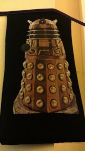An image of Super Dalek on decorative bunting in the main corridor of Shire Hall