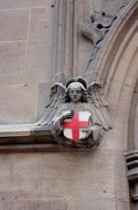 Angel relief on the exterior of All-Hallows-By-The-Tower church