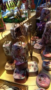 Tree decorated with chocolates tins