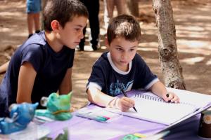 Liam and Julian concentrate on creating the best abstract artworks in the world