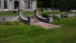 Small stone steps  leading from the restaurant into the heart of the gardens