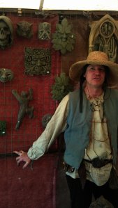 Owner of 1066 Creations, Simon proudly pose for a picture