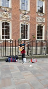Poppy WS sings in from of Guildhall in Worcester High Street